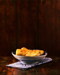 Croquettes with mushrooms on a rustic background