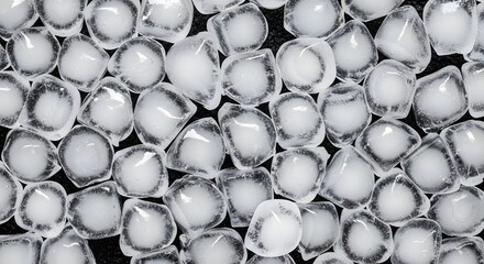 ice pellets densely scattered on a dark surface, creating an abstract frosty texture resembling hailstones