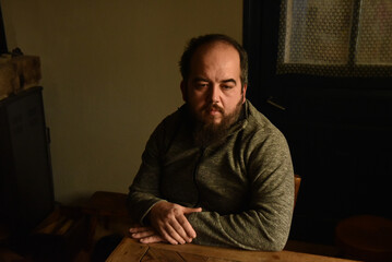 Man with beard in deep thought © salajean