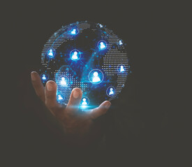 Global Business Network Concept, Hand Holding Glowing Digital Earth Sphere with User Profile Icons.