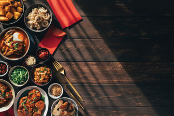 Traditional Asian Lunar New Year Dishes with Red Festive Decorations