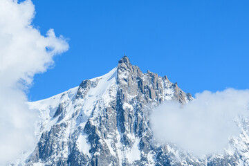 The Jagged Snowcovered Summit Aiguille