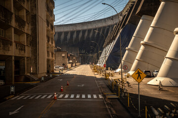 Naklejka premium Service Road with Concrete Structures and Turbines Inside the Itaipu Hydroelectric Complex - Paraná, Brazil