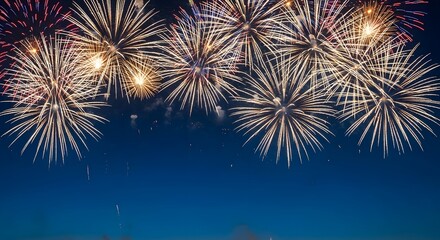 fireworks illuminate the deep blue night sky, celebrating a joyous occasion with vibrant bursts of light and color, creating a breathtaking festive atmosphere