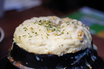 Fluffy Korean steamed egg (Gyeran-jjim) in a hot stone pot, a traditional side dish