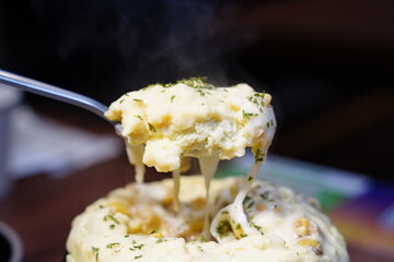Fluffy Korean steamed egg (Gyeran-jjim) in a hot stone pot, a traditional side dish