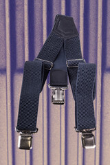 Black suspenders with clips for holding pants securely during daily activities and formal events in various settings