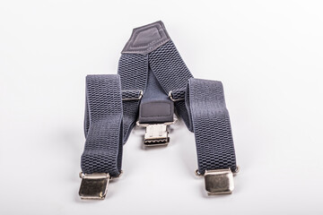 Black suspenders with clips for holding pants securely during daily activities and formal events in various settings