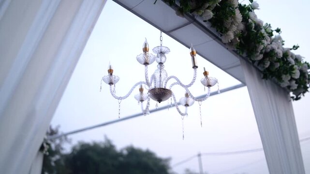 Elegant Wedding Venue Decor with Floral Arrangements and Ambient Lighting