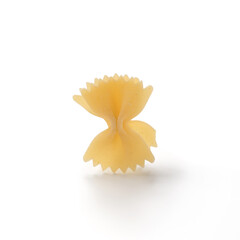 Italian dry farfalle pasta over white background with shadow top view