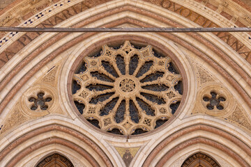 Obraz premium Details of portal of entrance gate to Lower Basilica of Saint Francis of Assisi, Assisi, Italy