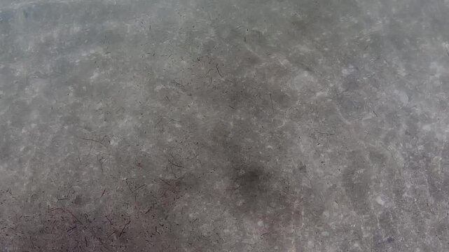 Blue water with rays of sunlight illuminating underwater. Footage taken by a go pro. Summer time in New Zealand.
