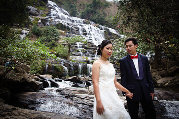 Portrait Wedding on huge Mae Ya waterfall Wedding in Asia
