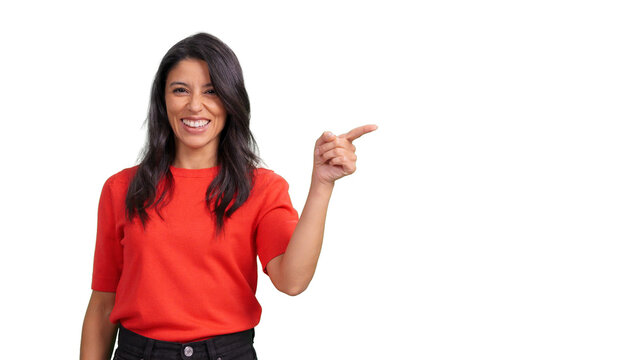 Woman smiling and pointing right to copyspace on transparent background