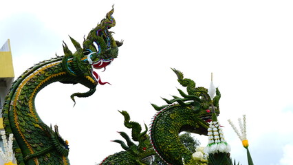 Close-up of ceremonial Thai Bai Sri offerings shaped as the legendary Great Serpent or Naga.