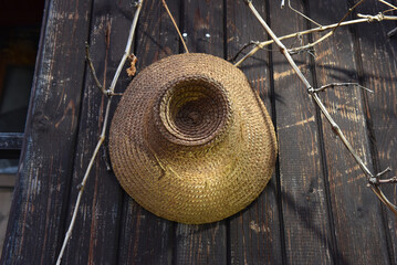 Straw hat on wall
