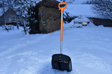 Snow shovel in winter