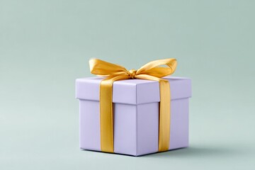 Obraz premium Lavender gift box adorned with bright yellow ribbon on soft back