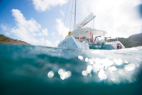Woman preparing to snorkel from private yacht in St Barths