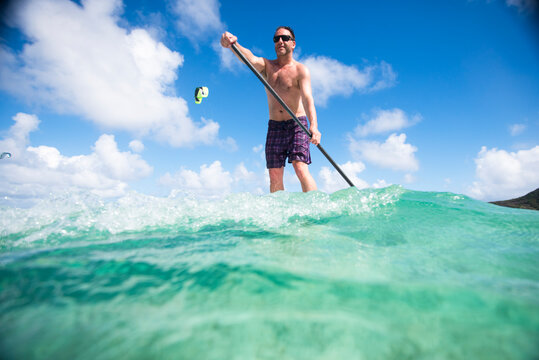 Man Paddleboarding in St Barths