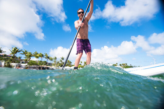 Man Paddleboarding in St Barths