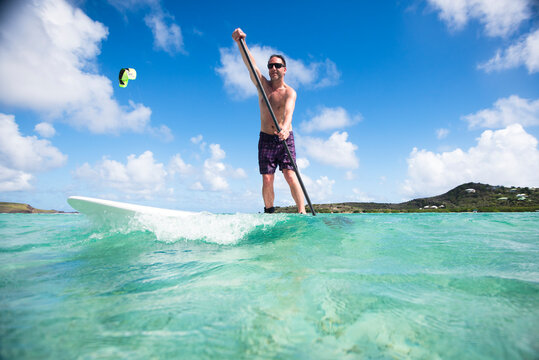 Man Paddleboarding in St Barths