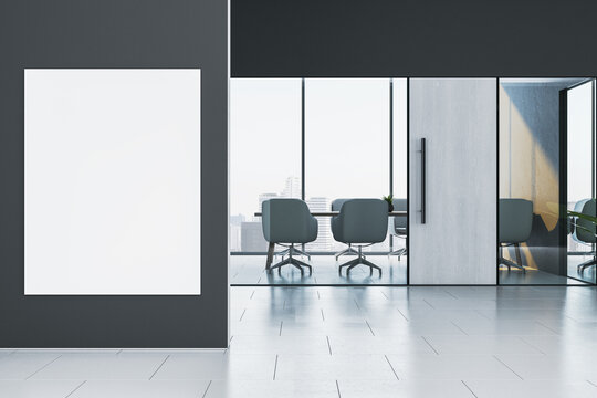 Vertical blank poster mockup on dark office wall near modern glass meeting room with city view and minimal corporate interior design. 3D Rendering