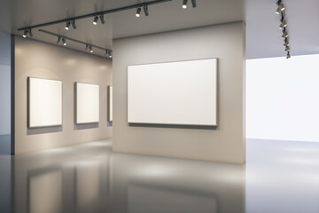 Blank canvas frames on walls of modern spacious art gallery with clean lighting and smooth...