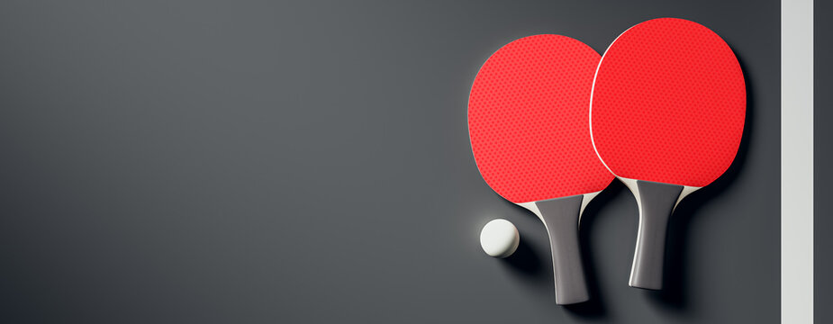 Table tennis paddles and ball on dark background with empty space for design or copyspace banner layout template concept for sport and tennis. 3D Rendering