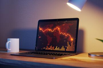 Laptop displaying global financial crisis data with downward red stock chart under desk lamp on wooden table at night. 3D Rendering