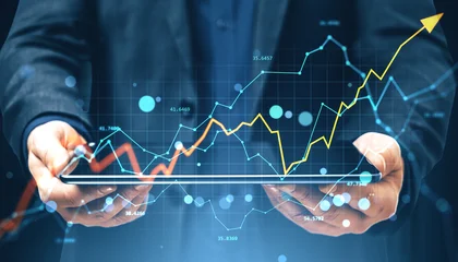 Fotobehang Sportwinkel Businessman holding tablet with financial charts and upward arrow showing growth and investment trends on abstract digital background.  © Who is Danny