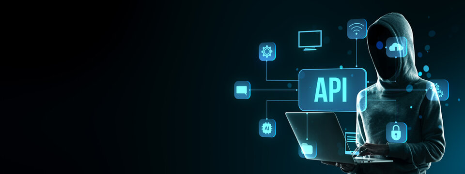 Anonymous hacker in hoodie using laptop with API interface icons on a digital network structure background for cybersecurity concept poster.