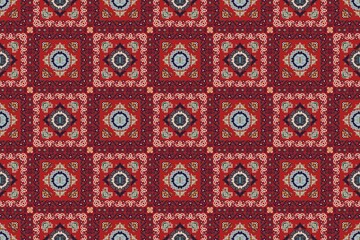 Vibrant red and blue patterned textile with intricate floral designs