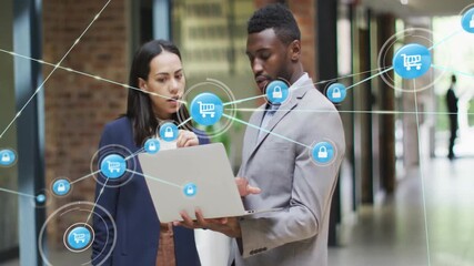 Colleagues talking over laptop analyzing ecommerce security with animated cart and lock network - Powered by Adobe