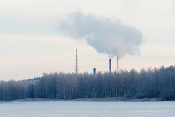 A landscape with smoking factory pipes