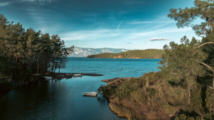 Beautiful early morning Marmaris view. Panoramic view of Defneli, Ayin Koyu, Okluk Koyu, Longoz Karacasogut, Marmaris. An aerial shot of small islets with pine trees in Saridana, Yediadalar, Gökova Ma