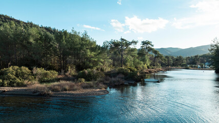 Beautiful early morning Marmaris view. Panoramic view of Defneli, Ayin Koyu, Okluk Koyu, Longoz Karacasogut, Marmaris. An aerial shot of small islets with pine trees in Saridana, Yediadalar, G&ouml;kova Ma
