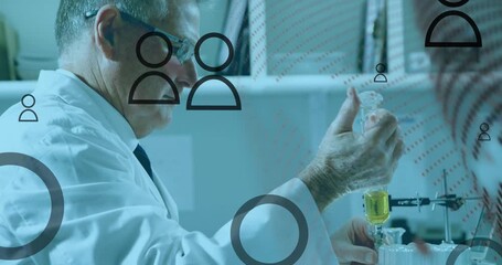 Animation of media icons and globe over caucasian male scientist in lab - Powered by Adobe