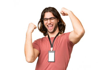 Young handsome man with ID card over isolated background celebrating a victory