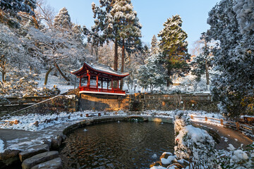 Sunrise after snowfall at Lu Hua Dao Park, Moganshan Scenic Area, Deqing County, Huzhou City, Zhejiang Province, China.