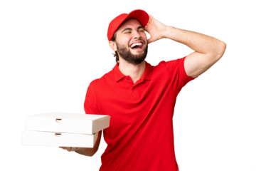 pizza delivery man with work uniform picking up pizza boxes over isolated chroma key background smiling a lot