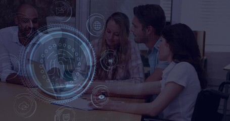 Diverse team discussing project with digital interface animation over meeting table - Powered by Adobe