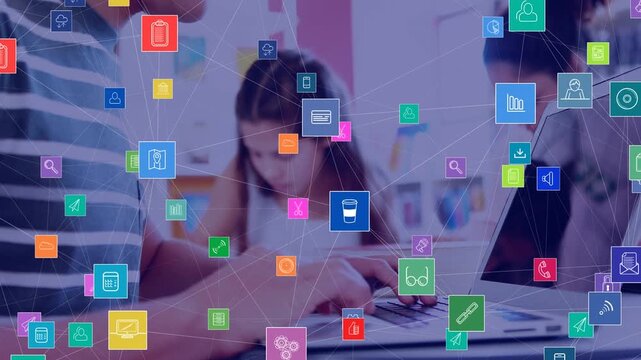 Network of digital icons against mid section of a boy using laptop in the class at school