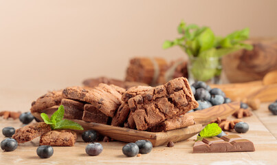 Brownie with fresh blueberries and mint.