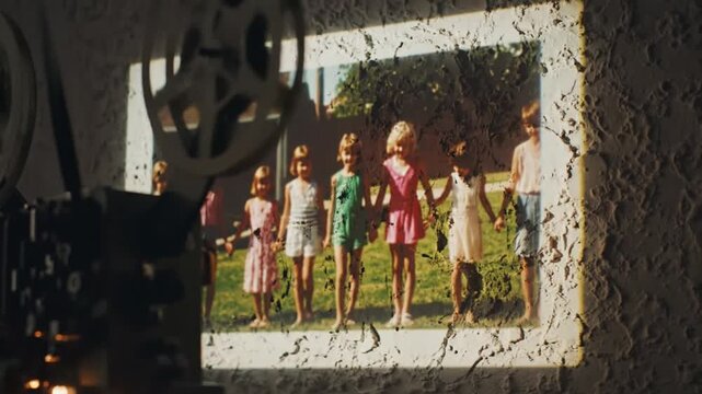 Nostalgic Photo of Children Holding Hands Projected by Old Film Projector