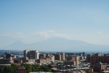 Breathtaking panoramic view of Yerevan city skyline with the majestic Mount Ararat under a clear blue sky in Armenia