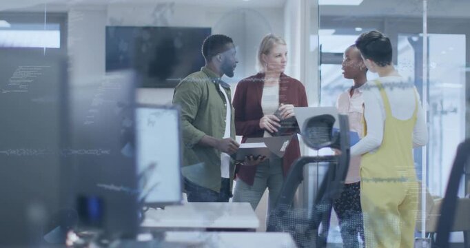 Man presenting folder to coworkers, blonde woman holding laptop and explaining marketing plan