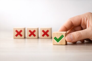 Choosing the Right Option: Wooden Blocks with Checkmarks and Crosses