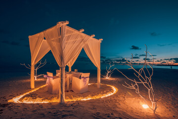 Dream romantic beach scene with love couple celebrating anniversary dinner proposal at sunset tropical island honeymoon setting palm trees calm ocean view summer vacation luxury travel background