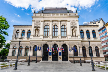 Obraz premium Facade of the National Gallery of Slovenia, a neoclassical building designed by Czech architect Frantisek Skabrout, home to Slovenia's main art collection, in Ljubljana, Slovenia